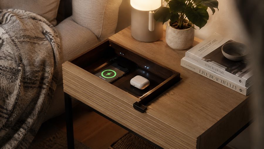 Hidden charging station inside a drawer keeping all charger cables out of sight