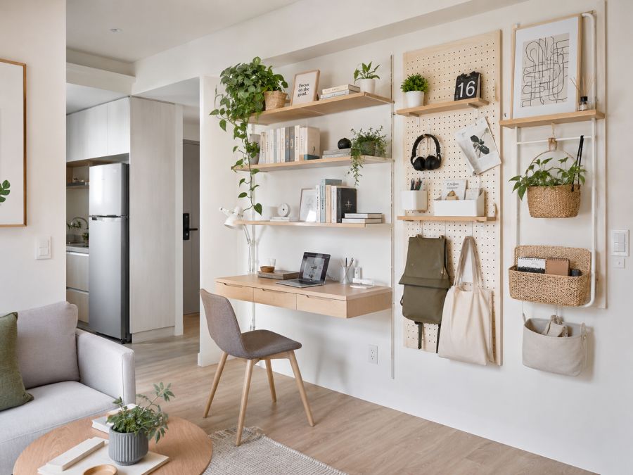 Wall-mounted shelving and vertical storage in small apartment